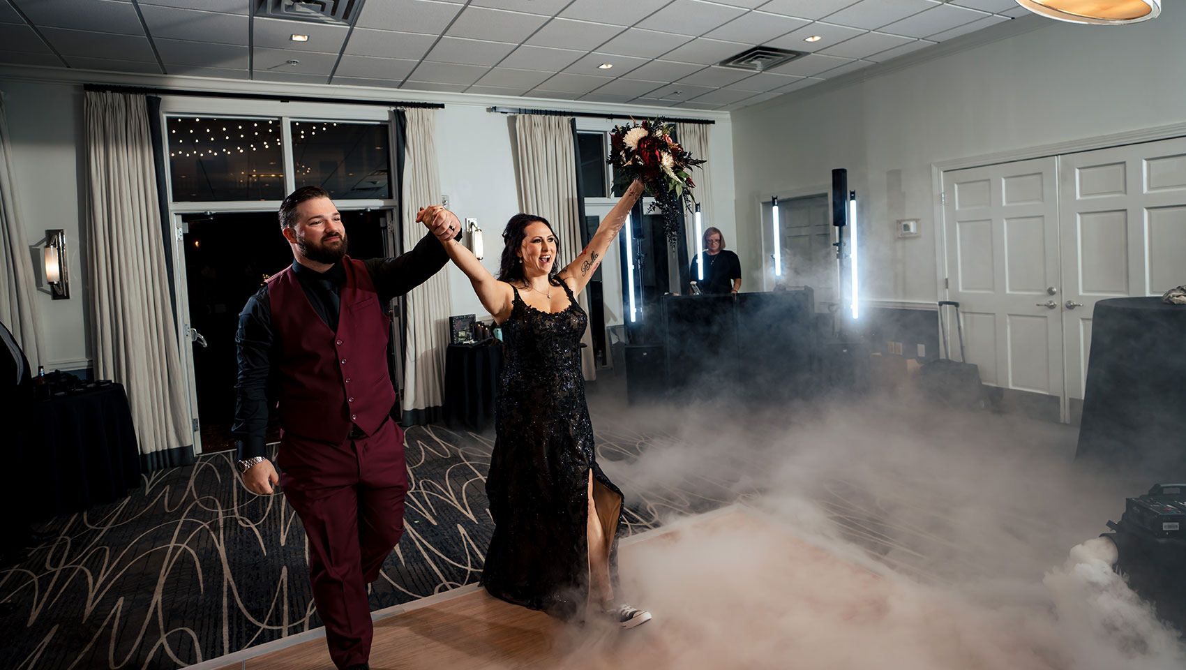 Bride and groom enter reception